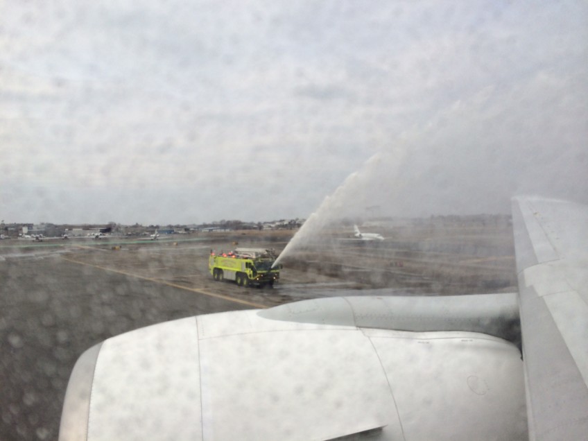 The inaugural flight DXB to BOS being sprayed by a Boston Fire Truck to commemorate its arrival.
